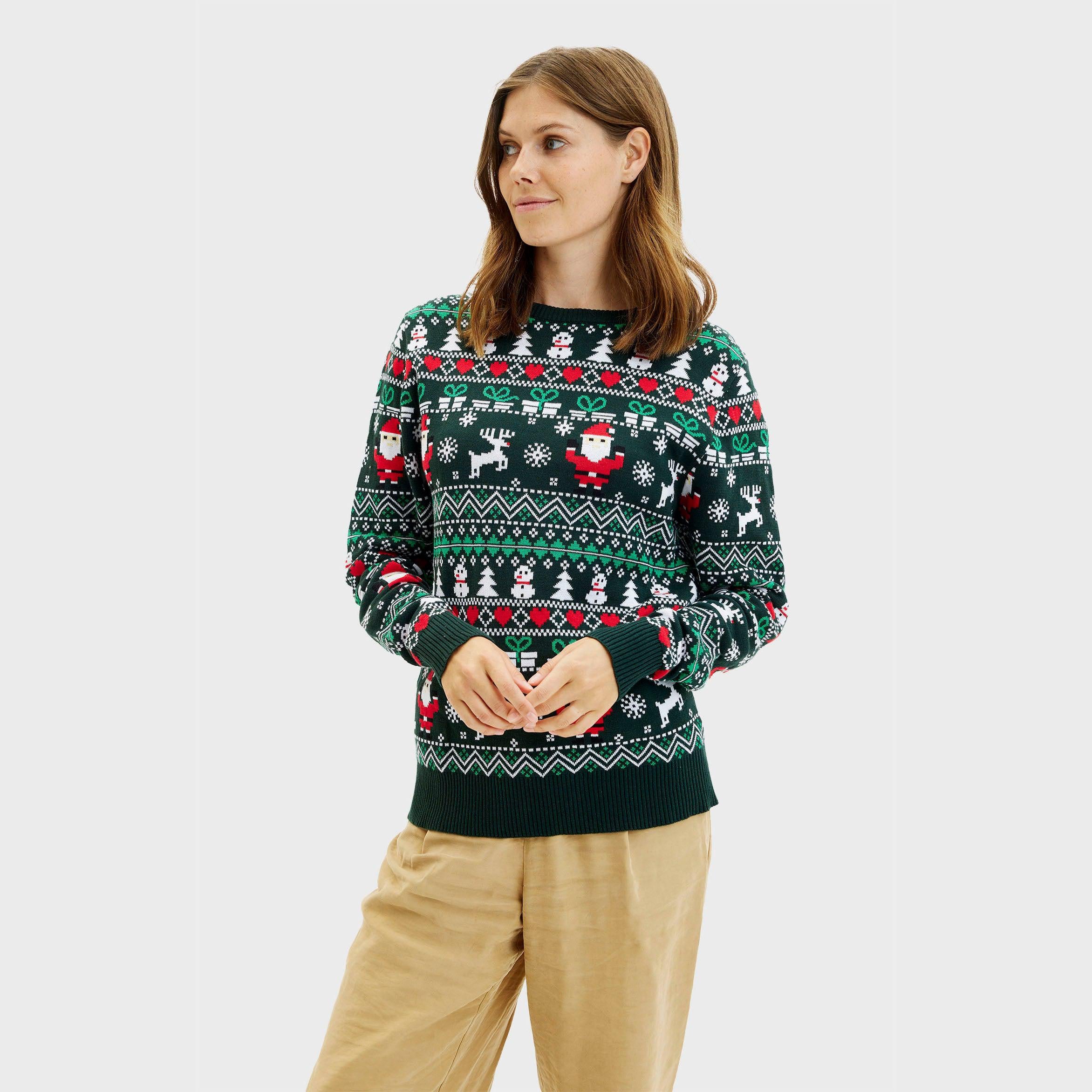 Grüner Weihnachtsstrickpullover Damen mit Rentieren, Schneeflocken und Weihnachtsmann-Motiv.